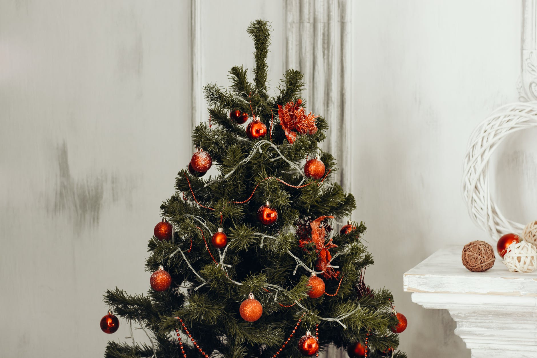 green christmas tree with orange bauble